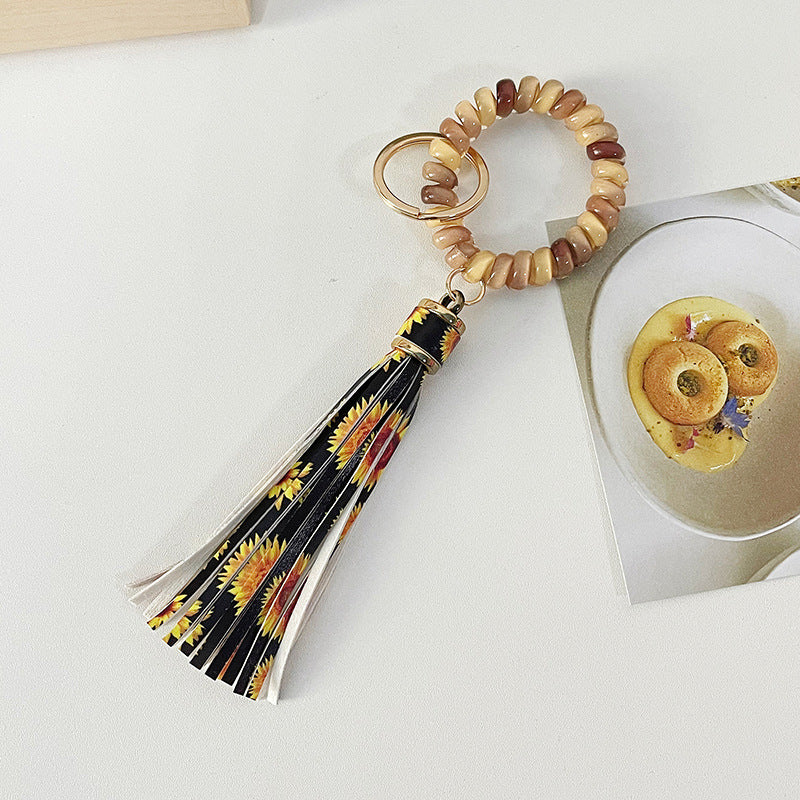 Brazalete al por mayor cable PU Leopardo Tassel Anti-Lost Keychains